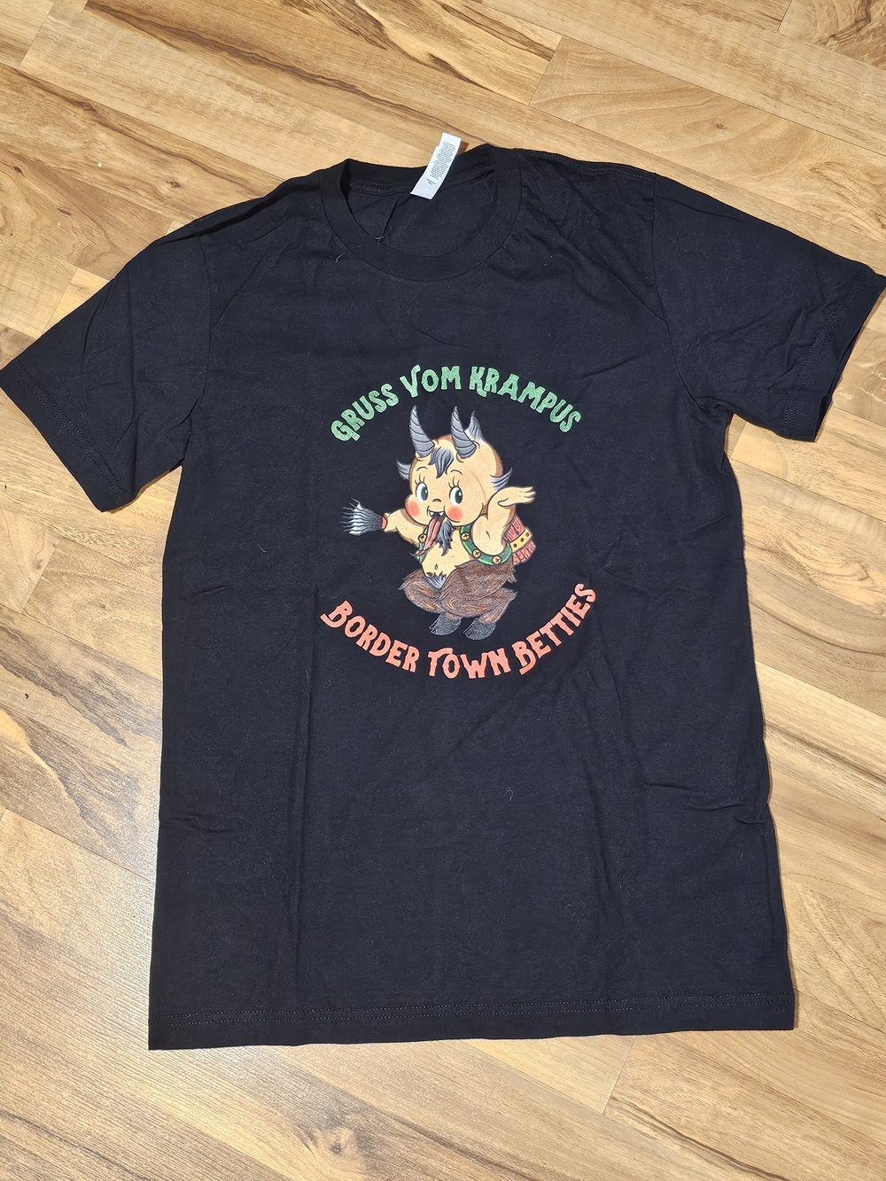 Bella Canvas Black Short-Sleeve Krampus Graphic Tee with Green and Red Accents
